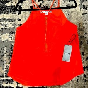 Spaghetti String orange HYFVE shirt. Zipper detail in the front.